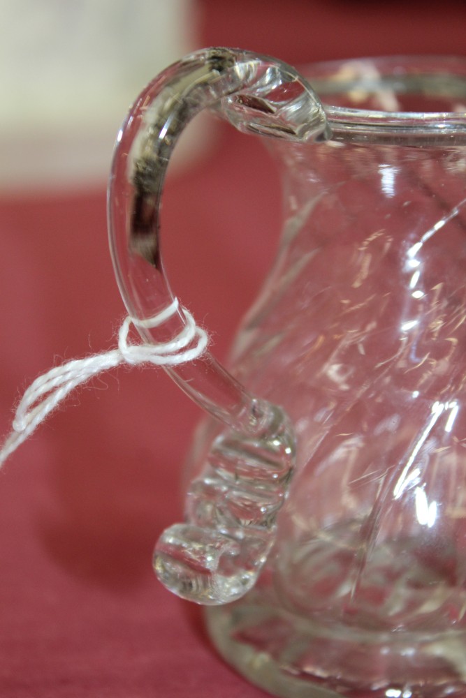 Two Georgian glass cream jugs with spiral-twist decoration, fold-over rims and loop handles, 8. - Image 8 of 16