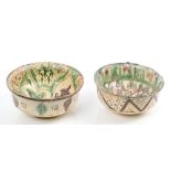 Two Islamic pottery bowls, believed from the Balmain area with cream, green and brown glaze,