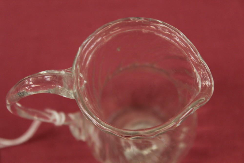 Two Georgian glass cream jugs with spiral-twist decoration, fold-over rims and loop handles, 8. - Image 15 of 16