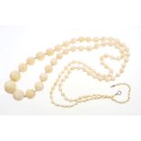 Late 19th century ivory bead necklace with a long string of one hundred and nineteen spherical