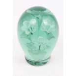 Victorian Stourbridge green glass dumpy weight with internal vase of flowers,