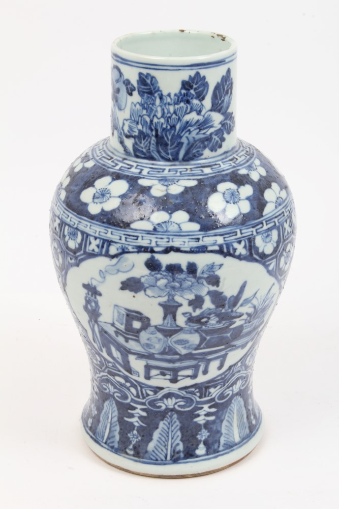 Late 19th century Chinese blue and white porcelain vase with precious object and floral decoration,