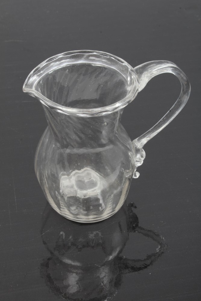 Two Georgian glass cream jugs with spiral-twist decoration, fold-over rims and loop handles, 8. - Image 4 of 16