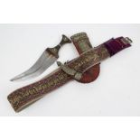 Mid-20th century Arab Jambia dagger with horn hilt and white metal and brown mounts,