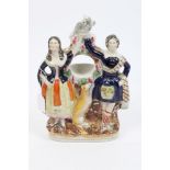 Victorian Staffordshire watch stand decorated with two Highland dancers, dog and parrot,