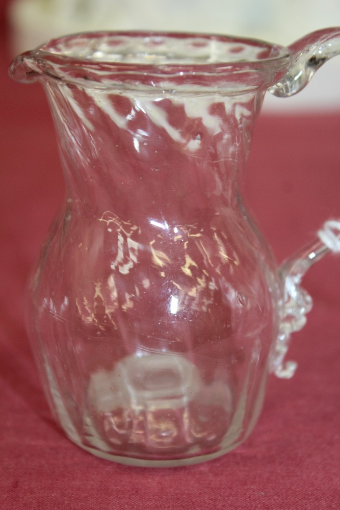 Two Georgian glass cream jugs with spiral-twist decoration, fold-over rims and loop handles, 8. - Image 11 of 16