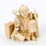 Late 19th century Japanese carved ivory figure of a kneeling carpenter with tools, 4.