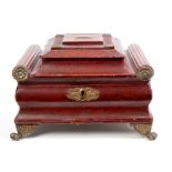 Fine Regency red leather covered casket of ornate classical sarcophagus form,