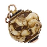 Fine quality 19th century Japanese carved ivory ojime of spherical form, finely carved with tiger,