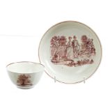 18th century Worcester Hancock printed tea bowl and saucer in brick-red,