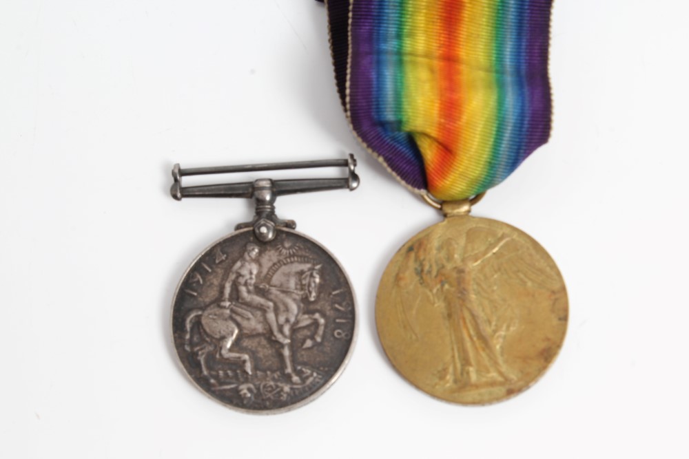 First World War pair medals - comprising War and Victory, named to 149838 GNR. C. Tidswell. R.