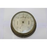 Brass cased ship's marine barometer by Kelvin & Hughes of typical cylindrical form,