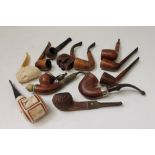 Selection of briar pipes - including one carved as a skull,