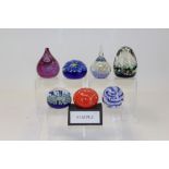 Collection of glass paperweights - including Caithness,
