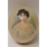 Ostrich egg painted head and shoulders portrait of a lady, signed - M.