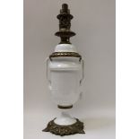 Late 19th / early 20th century oil lamp with tubular burner with pierced sliding cover and