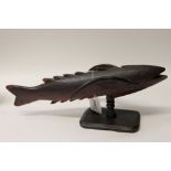 Carved Pitcairn fish stamped - Souvenir from Pitcairn, on rectangular stand,