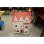 Modern dolls' house - wooden construction three-storey and bow window front,