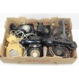 Six old telephones - including one wall-mounted, three dial-less,