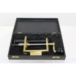 Polished and lacquered brass clock mainspring winder with accessories, Allen key, etc,