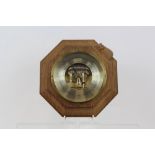 Twin Diaphragm Aneroid Barometer - in a brass case,