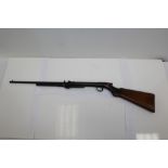 1920s air rifle numbered L24096 with carved walnut stock