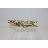 19th century naively carved ivory walrus tusk depicting an igloo and sleigh, polar bears,