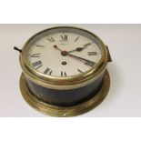 Early 20th century ships' brass bulkhead clock with eight day movement,