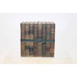 Huntley & Palmer novelty biscuit tin in the form of a pile of books with binding strap,