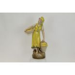 Royal Dux figure - lady carrying baskets - printed marks and pink triangle to base