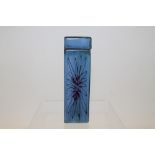 Troika rectangular pot and cover with flower decoration on blue glazed ground,