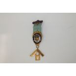 Of Masonic interest: Gold (18ct), (9ct) and silver gilt enamelled Masonic medal,