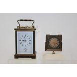 Contemporary carriage clock with eight day repeat / alarm movement signed on the back plate -