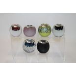 Six modern silver mounted glass globular match strikers - various dates and makers,