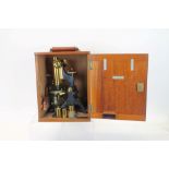 Mid-20th century brass and lacquered microscope by W Watson & Sons Ltd, 313 High Holborn, London,