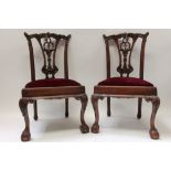 Pair of mahogany children's miniature dining chairs in the Chippendale style,