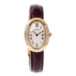 Fine Cartier ladies' gold (18ct) Baignoire diamond set wristwatch with curved oval dial with black