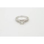 Diamond single stone ring with a princess cut diamond estimated to weigh approximately 0.