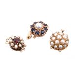 Three clasps - to include gold and pearl, gold, garnet and pearl and gold,