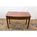 Edwardian mahogany bow front writing table,