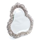 Victorian silver dressing table mirror of trefoil form,