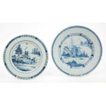 Two mid-18th century English Delft plates painted with chinoiserie landscapes,