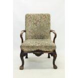 George II mahogany framed open armchair with shepherd's crook arms and carved shell apron,