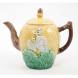 Victorian Majolica teapot and cover with moulded flora and leaf decoration, yellow,