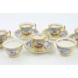 Early 19th century Coalport part tea set with painted micromosaic-style bird reserves on gilt and