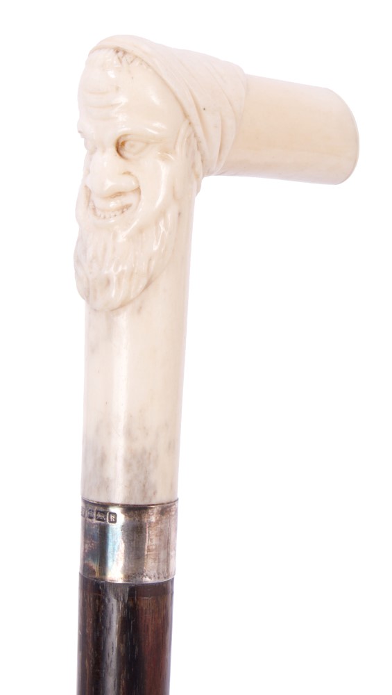 Good late 19th century / early 20th century carved ivory-handled exotic hardwood walking cane,