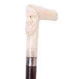 Good late 19th century / early 20th century carved ivory-handled exotic hardwood walking cane,