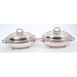 Pair Victorian two-handled Elkington silver plated entrée dishes of oval form,