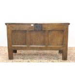 17th century panelled oak coffer with triple panel front, raised on stiles,