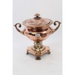 Regency copper and brass samovar with domed wrythen cover and twin scrolled handles,